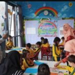 DARMA WANITA MENGAJAR.png1