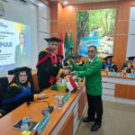 Andi Sismar Raih Doktor, Dorong UMKM Pariwisata Papua Barat Daya Terapkan Green Marketing