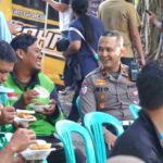 HUT ke-71 Lalu Lintas, Satlantas Polresta Malang Kota Ajak 500 Ojol Makan Bersama dan Cek Kesehatan Gratis